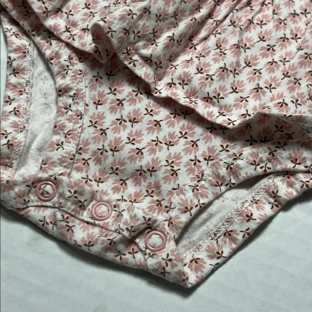 Carter’s pink and white floral long sleeve skirted one piece body suit size 3 m